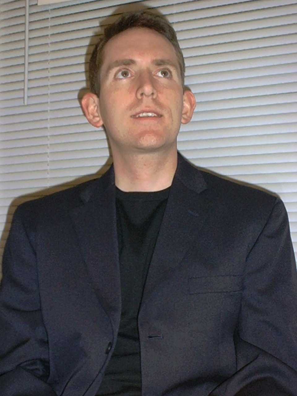 A Guy in a suit; Actual size=240 pixels wide